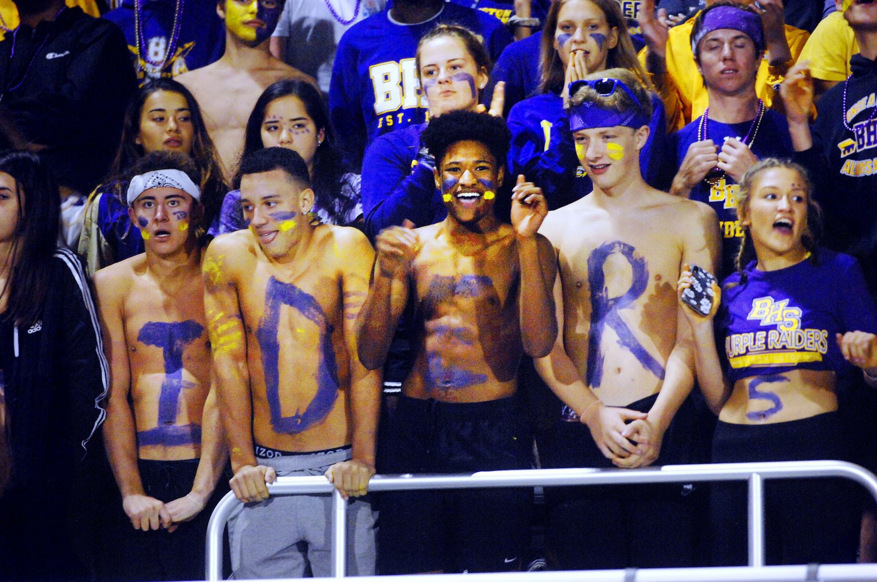 Shirtless cheerleaders